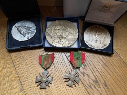 null Set of three medals and two military decorations.