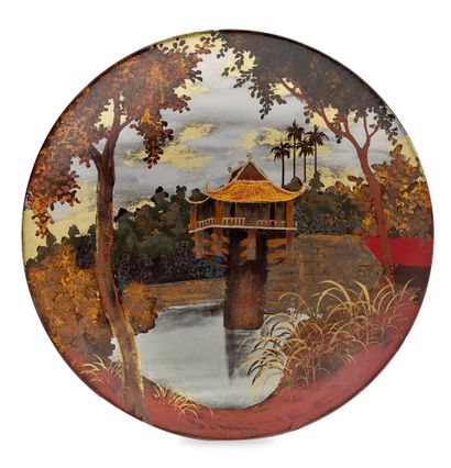 VIETNAM - XXE SIÈCLE Two lacquered wooden plates decorated with pavilions and houses...