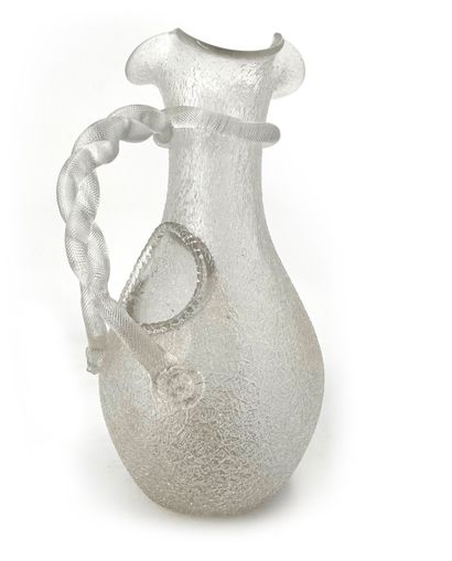 BIOT (dans le goût de) 
Cracked glass orangeade pitcher with skirted neck, twisted...
