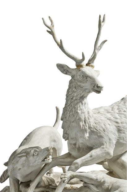 PARIS 
Porcelain biscuit group after the Sèvres model representing a deer attacked...