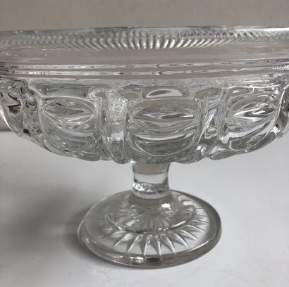 BACCARAT A moulded and draped crystal fruit bowl with star decoration on the foot.
Drapery...