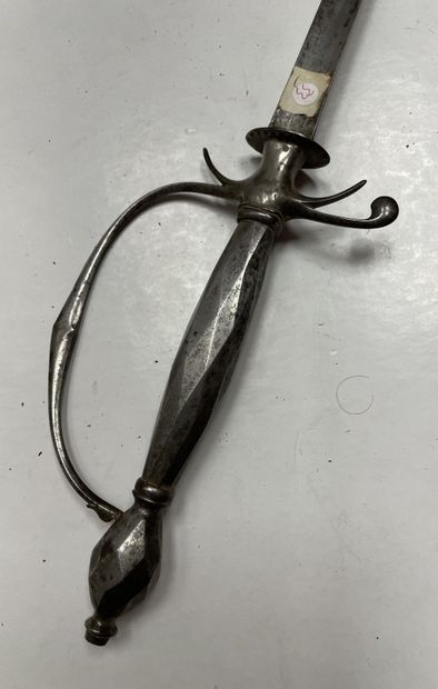 null Town sword
Iron frame. Pommel and spindle worked with sides. Guard with a branch...