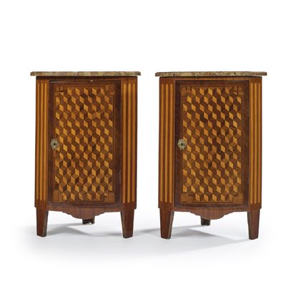 null Pair of inlaid veneer corner cabinets. They open with a leaf decorated with...