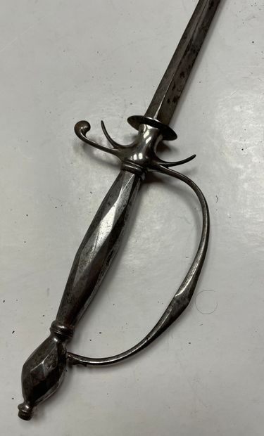 null Town sword
Iron frame. Pommel and spindle worked with sides. Guard with a branch...