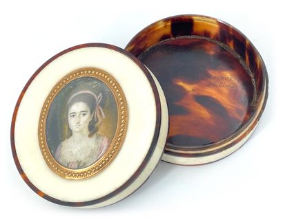 null Circular fly box in tortoiseshell and ivory, the lid set with a polychrome miniature...