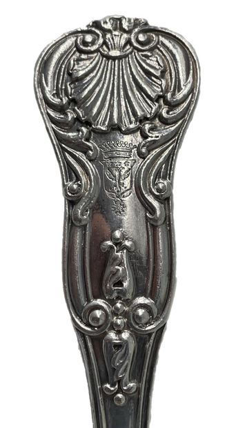 null Part of a silver household set decorated with shells, scrolls and palmettes...