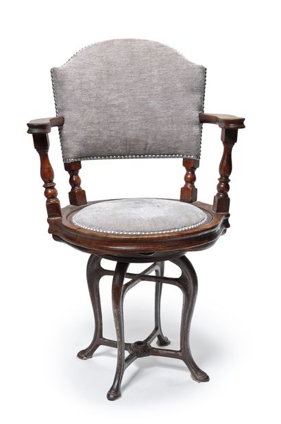 FRANCE, fin XIXème siècle Captain's chair in exotic wood on four cast iron legs,...