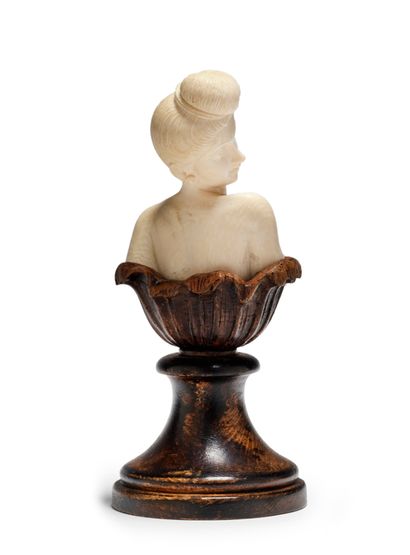 TRAVAIL 1900 
* Ivory sculpture of a woman revealing her breasts
Stained wood base
H...