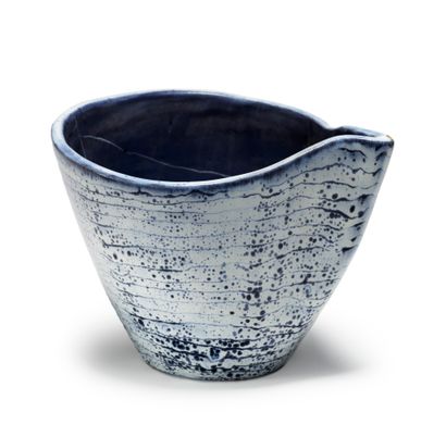MADO JOLAIN (née en 1921) 
Free-form blue-grey glazed ceramic vase
Signed "MJ"
H...