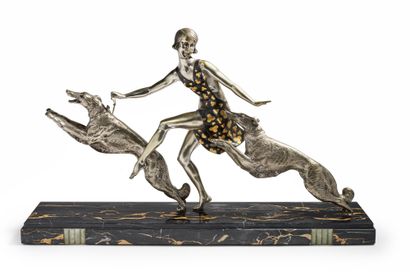Jean LORMIER (XXème) 
Sculpture en bronze à patine argenté, noire et dorée figurant...