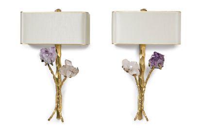 WILLY DARO (XXème) 
A pair of two-armed gilt bronze sconces decorated with two blocks...