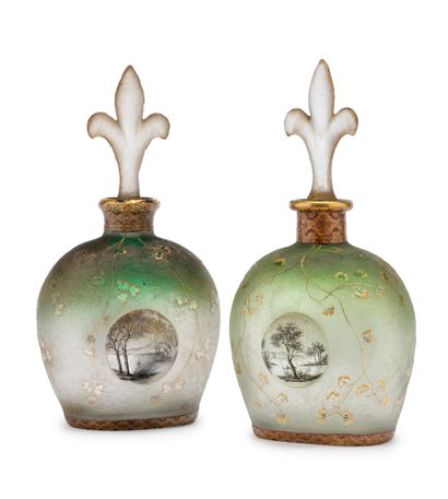 DAUM Nancy Rare pair of lined glass bottles with acid-etched decoration of floral...