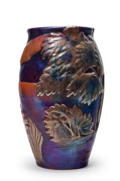 Vilmos ZSOLNAY (1828-1900) A glazed ceramic shoulder vase with iridescent glaze and...