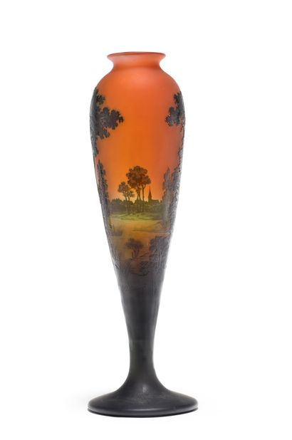 D'ARGENTAL A lined glass baluster vase with acid-etched decoration of a lake landscape...