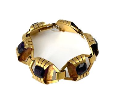 null Bracelet articulé en or 18k (750) serti de six pierres violettes taillées en...