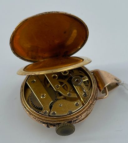 null Petite montre de gousset formant pendentif en or (doublure en or)

Poids brut...