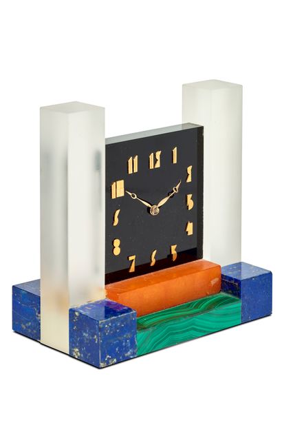 JEAN FOUQUET (1899-1984) 


Rare modernist clock in onyx, crystal, carnelian, lapis...