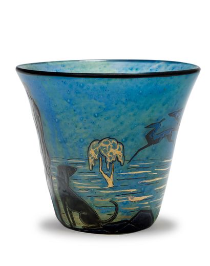 Marcel GOUPY (1886-1954) 


Vase en verre polychrome à décor émaillé rehaussé de...