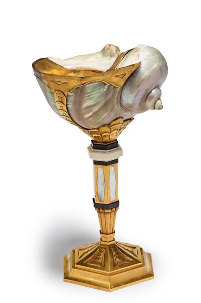 Henri et René TRESER 
A cup on a pedestal decorated with a shell, gilded bronze mount...