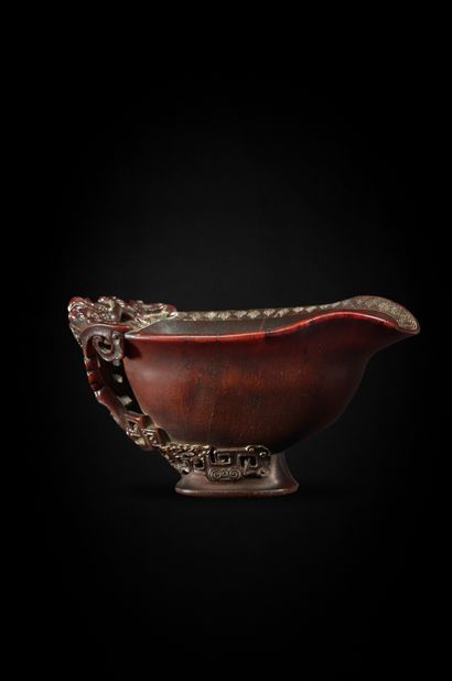 CHINE - XVIIe siècle 
A very beautiful libation cup made of dark rhinoceros horn,...