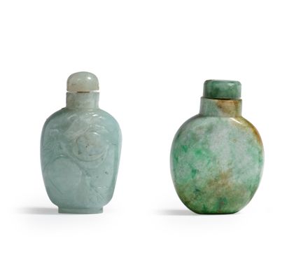 CHINE - XIXe siècle Two jadeite snuff bottles, one rectangular with relief carved...