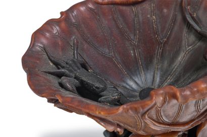 CHINE - XVIIIe siècle 
A rhinoceros horn libation cup carved in the shape of a leaf...