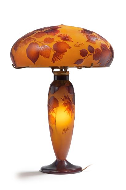 ÉTABLISSEMENTS GALLÉ Doubled glass lamp with acid-etched decoration of hazelnut trees...