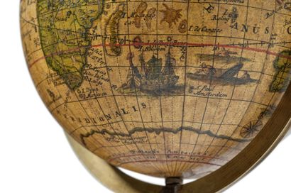 null 
Globe captioned mainly in Latin. It rotates in its brass meridian circle with...