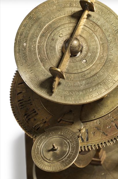 null 
Mechanical equinoctial and declinatory dial in brass, rectangular plate with...