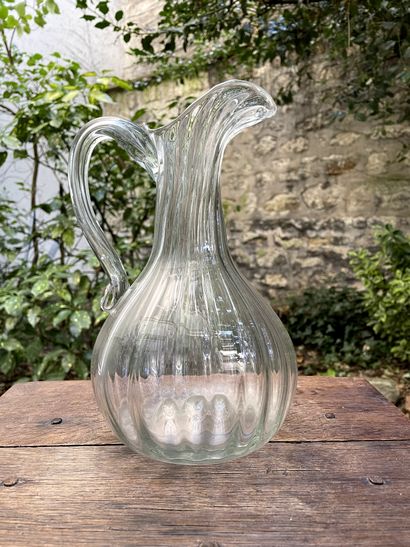 null Blown glass cider pitcher.

Normandy, late 18th century

H. 25 cm
