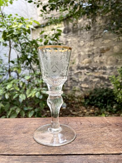 null Blown glass wine glass with armorial decoration under ducal crown. Cut leg....