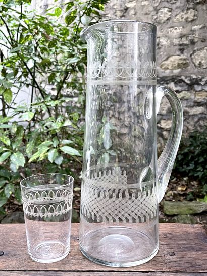 null 
Pitcher and five orangeade glasses in crystal engraved with frieze of interlacing.


Circa...