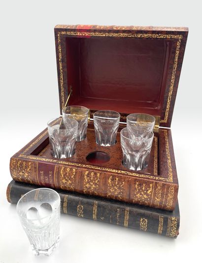 null Liqueur box imitating four books including Dalloz and
History of France opening...