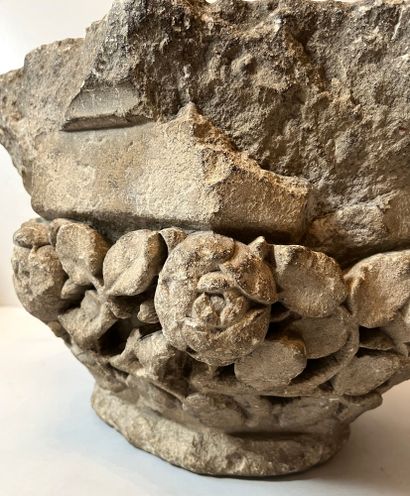 null 
Limestone capital carved on all sides with decoration of intertwined rose branches,...