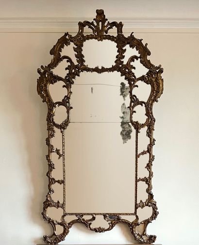 null Mirror with pareclose composed of old elements in wood and gilded stucco with...