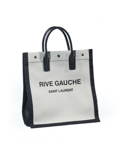 SAINT LAURENT Rive gauche
Shopping bag in white printed linen and leather
38 x 39...