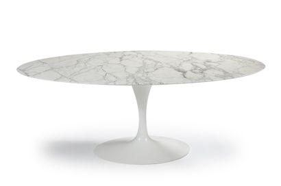 Eero Saarinen (1910-1961) Dining table, oval top in white veined marble, tulip base...