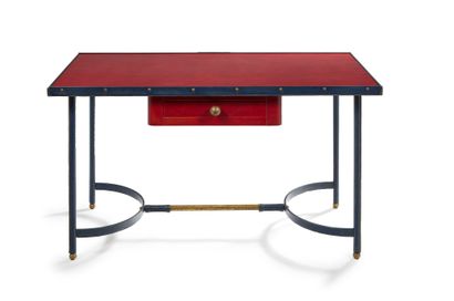 Jacques ADNET, attribué à Desk entirely sheathed in midnight blue and red leather...