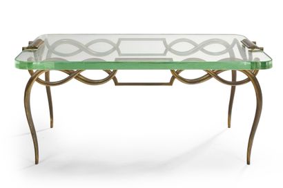 René DROUET (1899-1993) Low table in gilded metal with a thick glass slab top resting...
