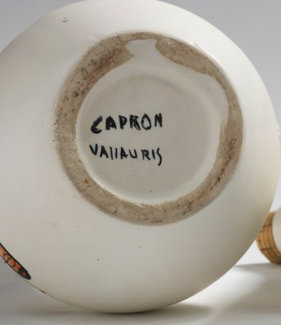 ROGER CAPRON (1922-2006) Bouteille « Rhum » en céramique émaillée polychrome
Signée...