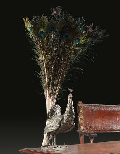 Pair of peacocks in patinated metal, the...