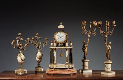 null Pair of candelabras in white marble and chased and gilded bronze with four arms...