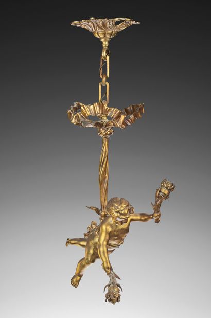 null Lustre en bronze ciselé et doré figurant un putto retenu par une écharpe noué...