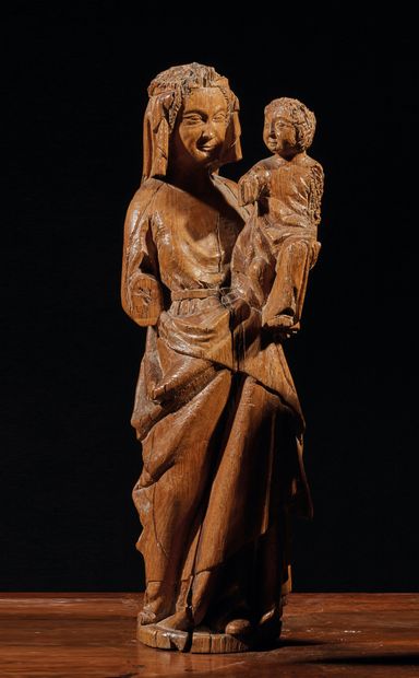Vierge à l'Enfant en chêne sculpté en ronde-bosse...