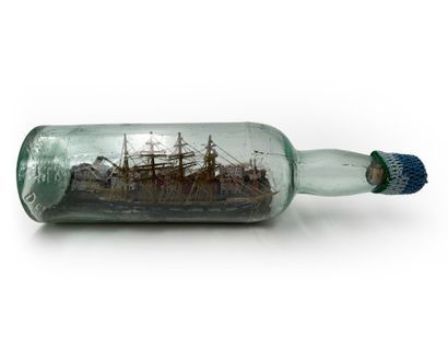Boat in bottle Four masts barque on a background...