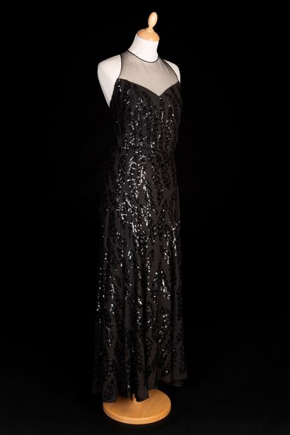 LUCEBER Evening dress in black silk crepe embroidered with a decoration of leaves...