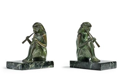 Marcel PAUTOT (1886-1963) Pair of bookends in bronze with green patina representing...
