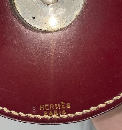 HERMES, Paris Lampe à fut circulaire en rondelle de cuir cognac à piqures sellier...