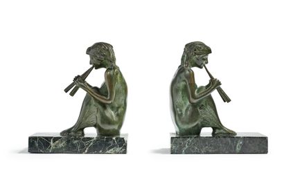 Marcel PAUTOT (1886-1963) Pair of bookends in bronze with green patina representing...