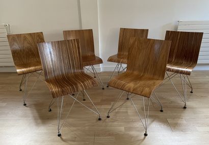 TRAVAIL MODERNE Suite of six chairs, thermoformed wood shell, chromed metal base,...
